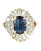 Blue Sapphire and Diamond Halo Ring in Yellow Gold